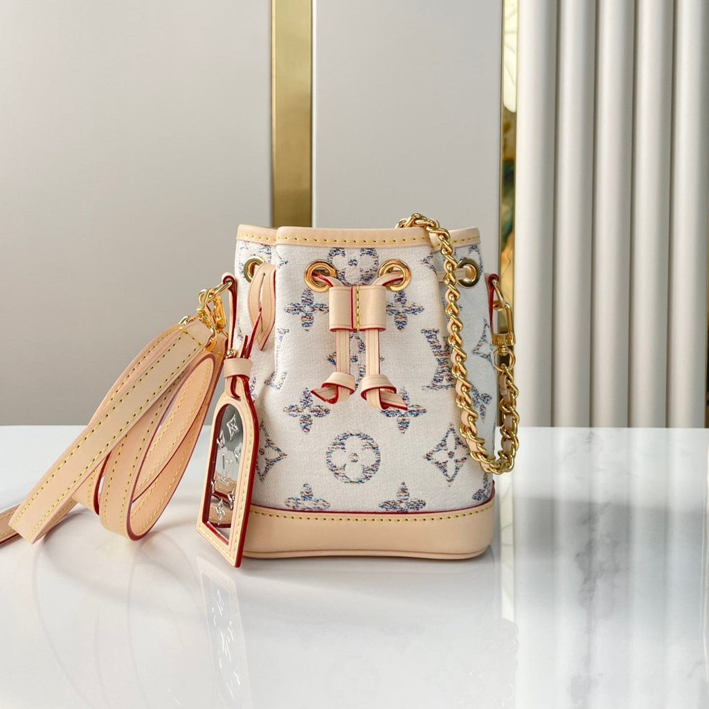 LOUIS VUITTON NANO NOÉ 16 IN WHITE MONOGRAM JACQUARD FABRIC AND BEIGE CALFSKIN TRIM