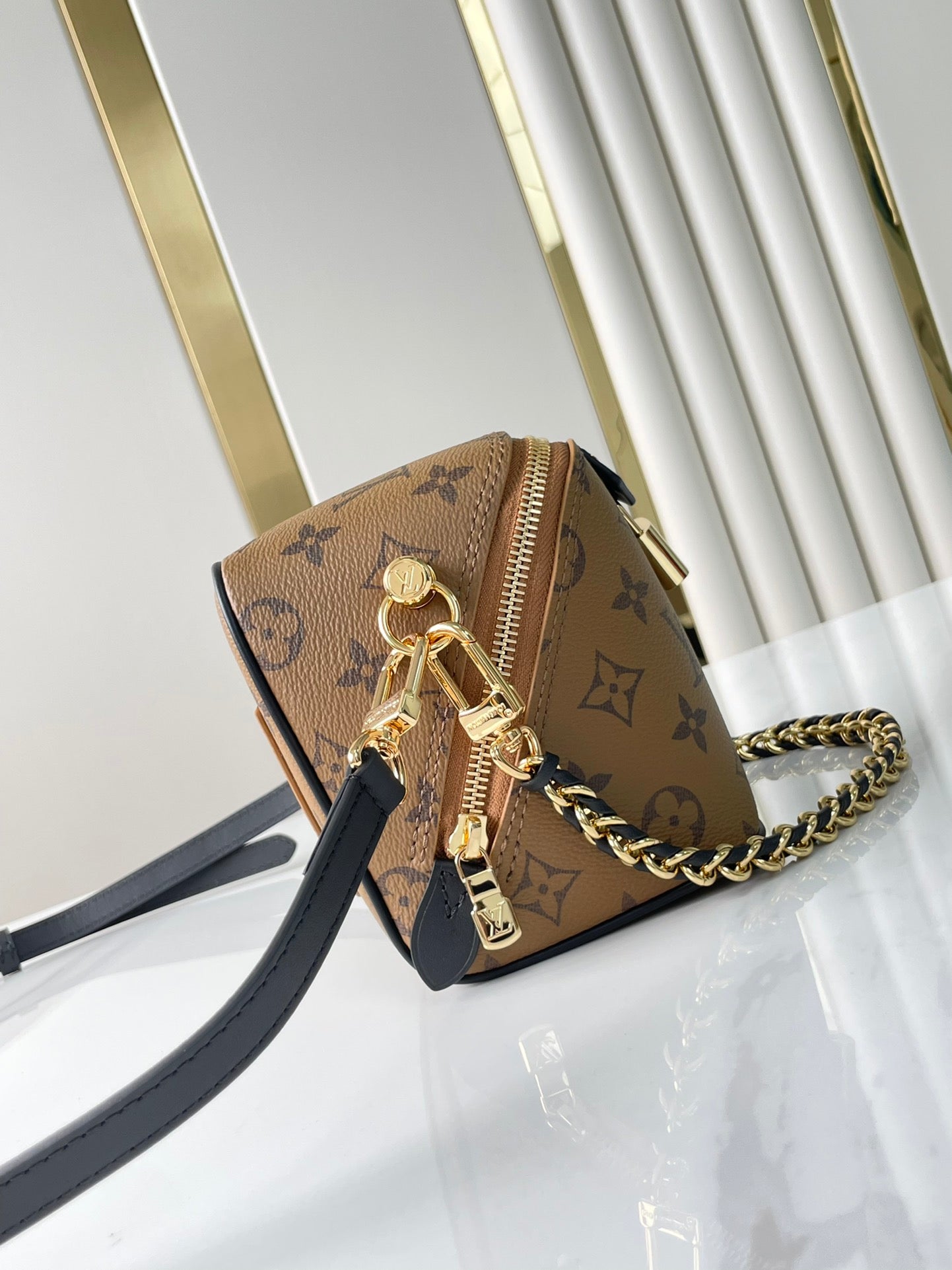 LOUIS VUITTON JUST IN CASE 14 IN BROWN MONOGRAM REVERSE CANVAS GOLD HARDWARE