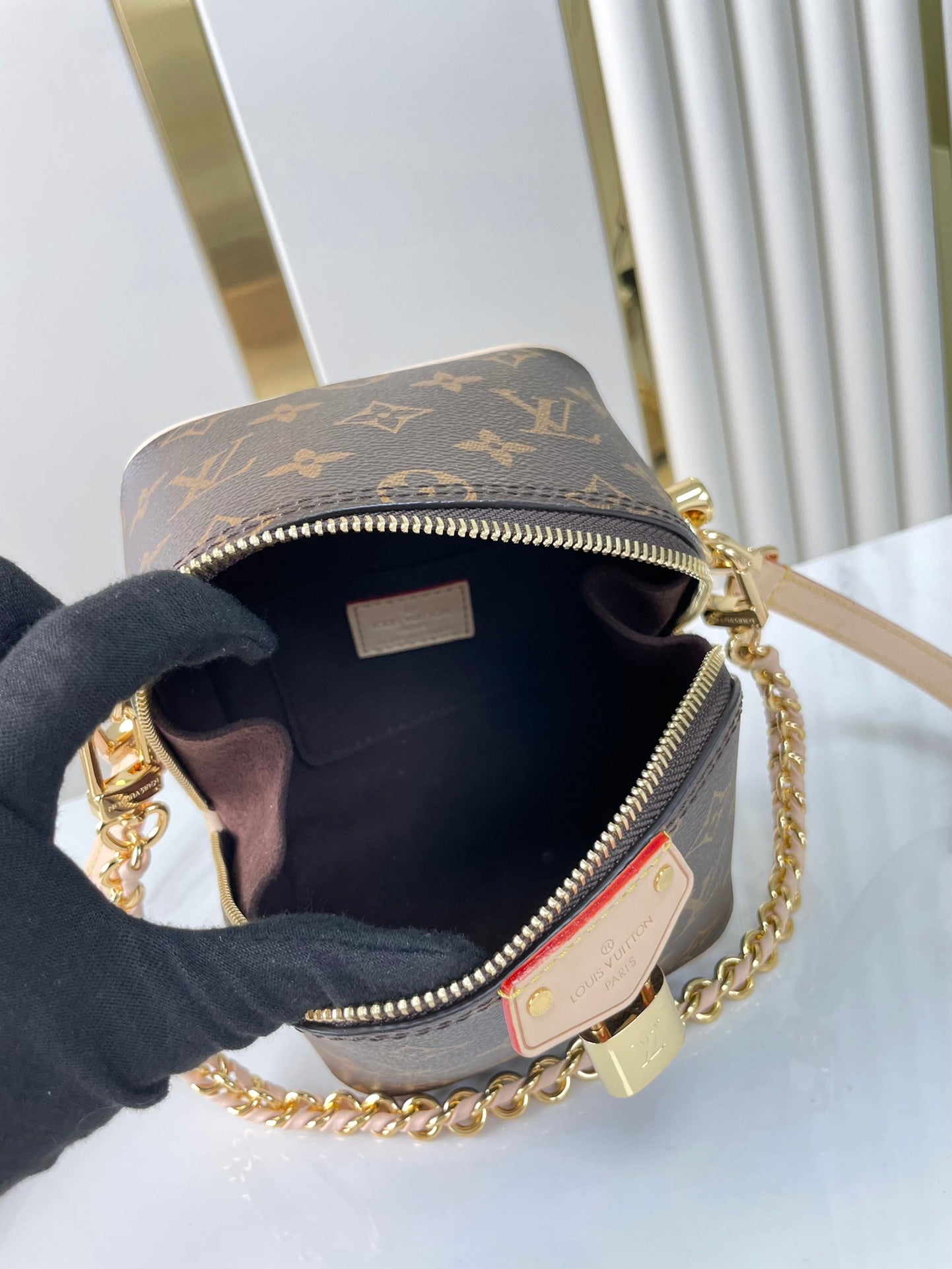 LOUIS VUITTON JUST IN CASE 14 IN BROWN MONOGRAM CANVAS GOLD HARDWARE