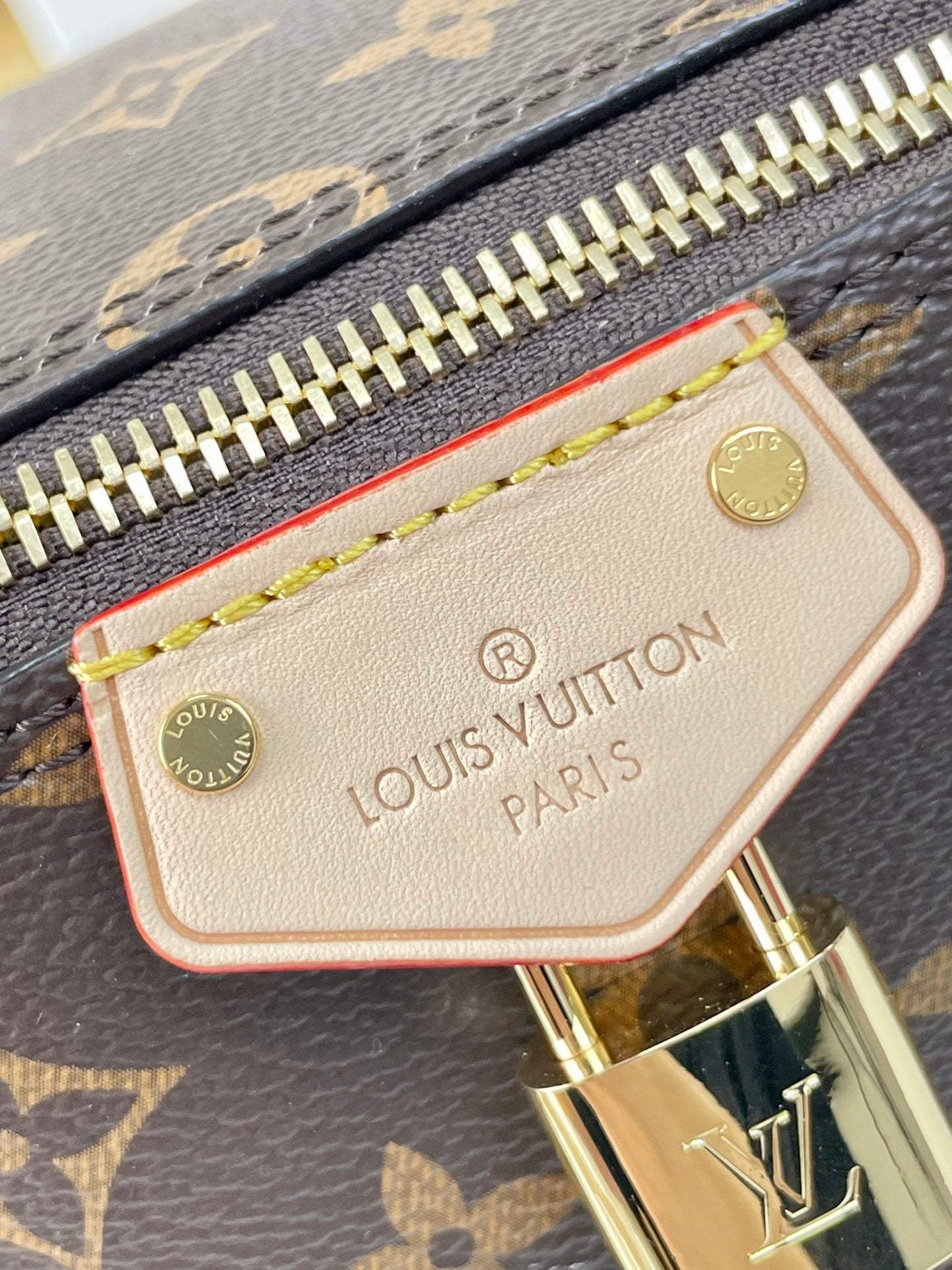 LOUIS VUITTON JUST IN CASE 14 IN BROWN MONOGRAM CANVAS GOLD HARDWARE