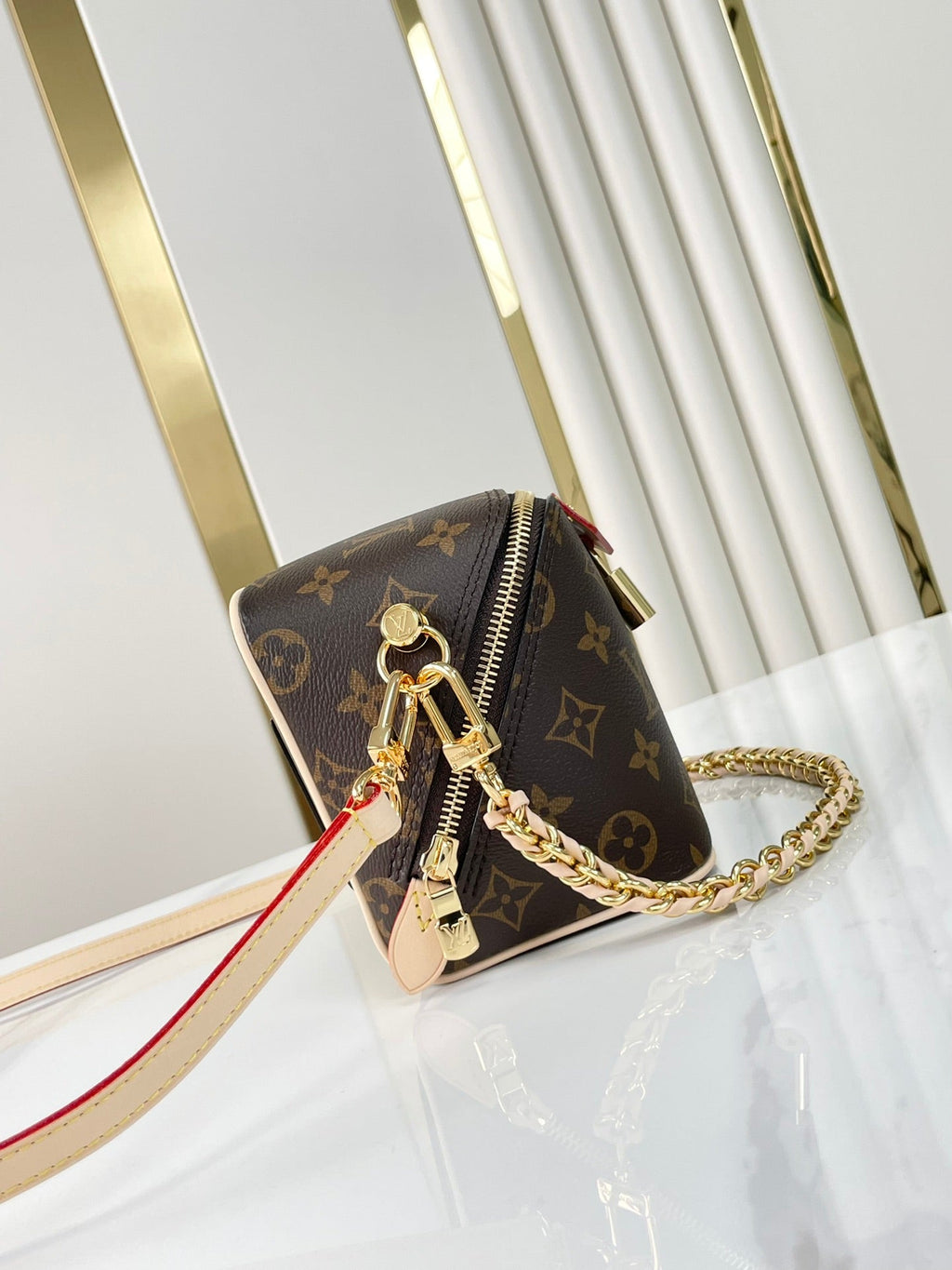 LOUIS VUITTON JUST IN CASE 14 IN BROWN MONOGRAM CANVAS GOLD HARDWARE