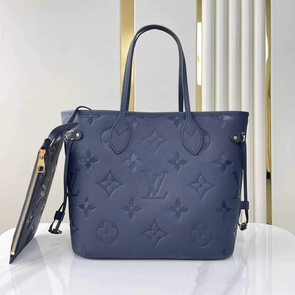 LOUIS VUITTON NEVERFULL MM 31 IN DARK NAVY MONOGRAM EMPREINTE LEATHER