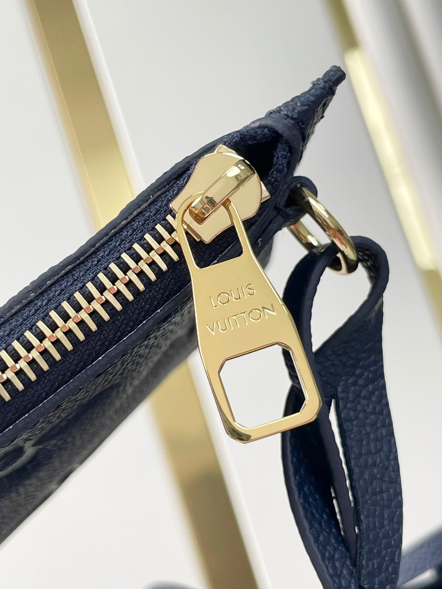 LOUIS VUITTON NEVERFULL MM 31 IN DARK NAVY MONOGRAM EMPREINTE LEATHER