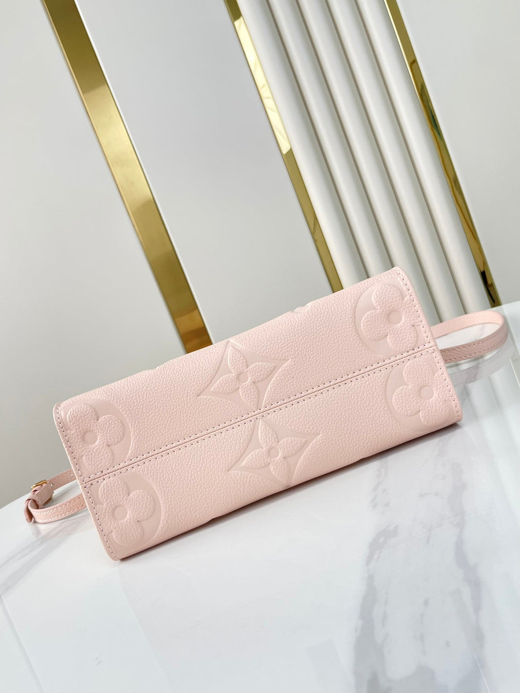 LOUIS VUITTON ONTHEGO PM 25 IN OPALE PINK MONOGRAM EMPREINTE LEATHER