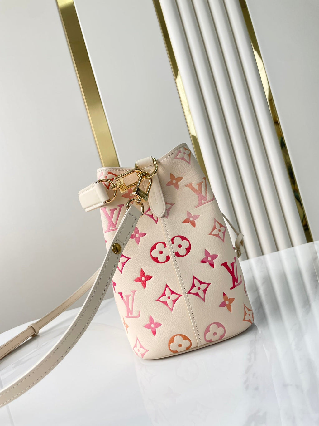 LOUIS VUITTON NÉONOÉ BB 20 IN SUNRISE AQUARELLE MONOGRAM EMPREINTE LEATHER