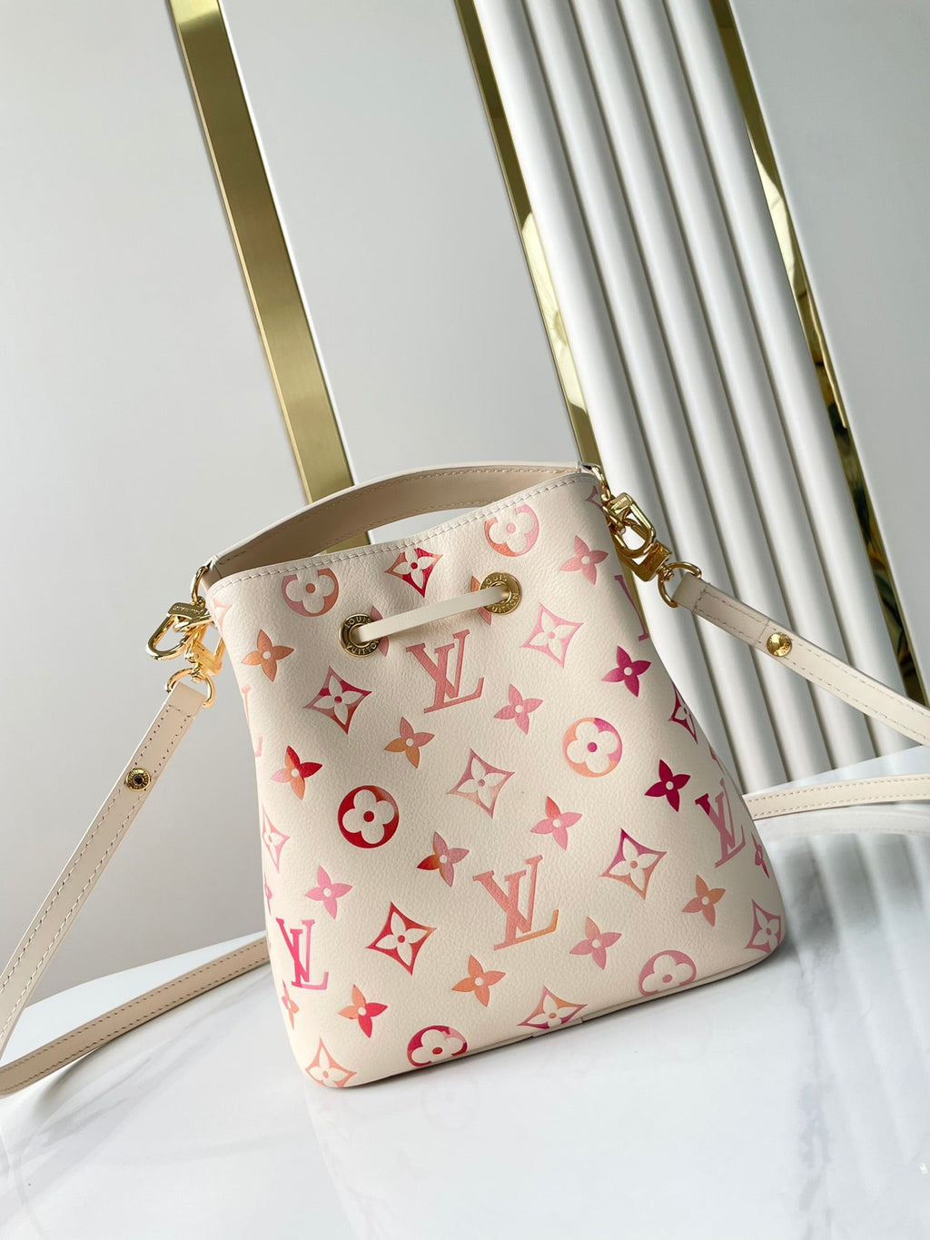 LOUIS VUITTON NÉONOÉ BB 20 IN SUNRISE AQUARELLE MONOGRAM EMPREINTE LEATHER