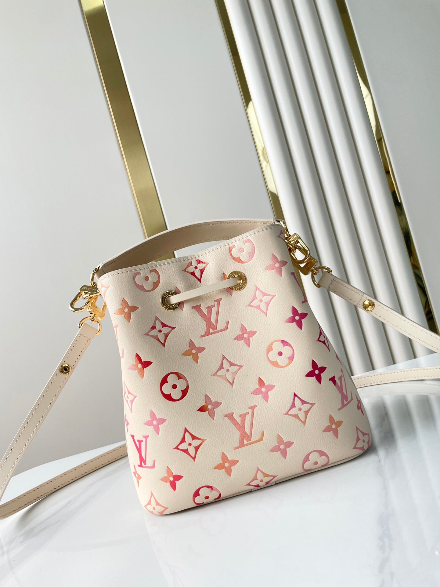 LOUIS VUITTON NÉONOÉ BB 20 IN SUNRISE AQUARELLE MONOGRAM EMPREINTE LEATHER
