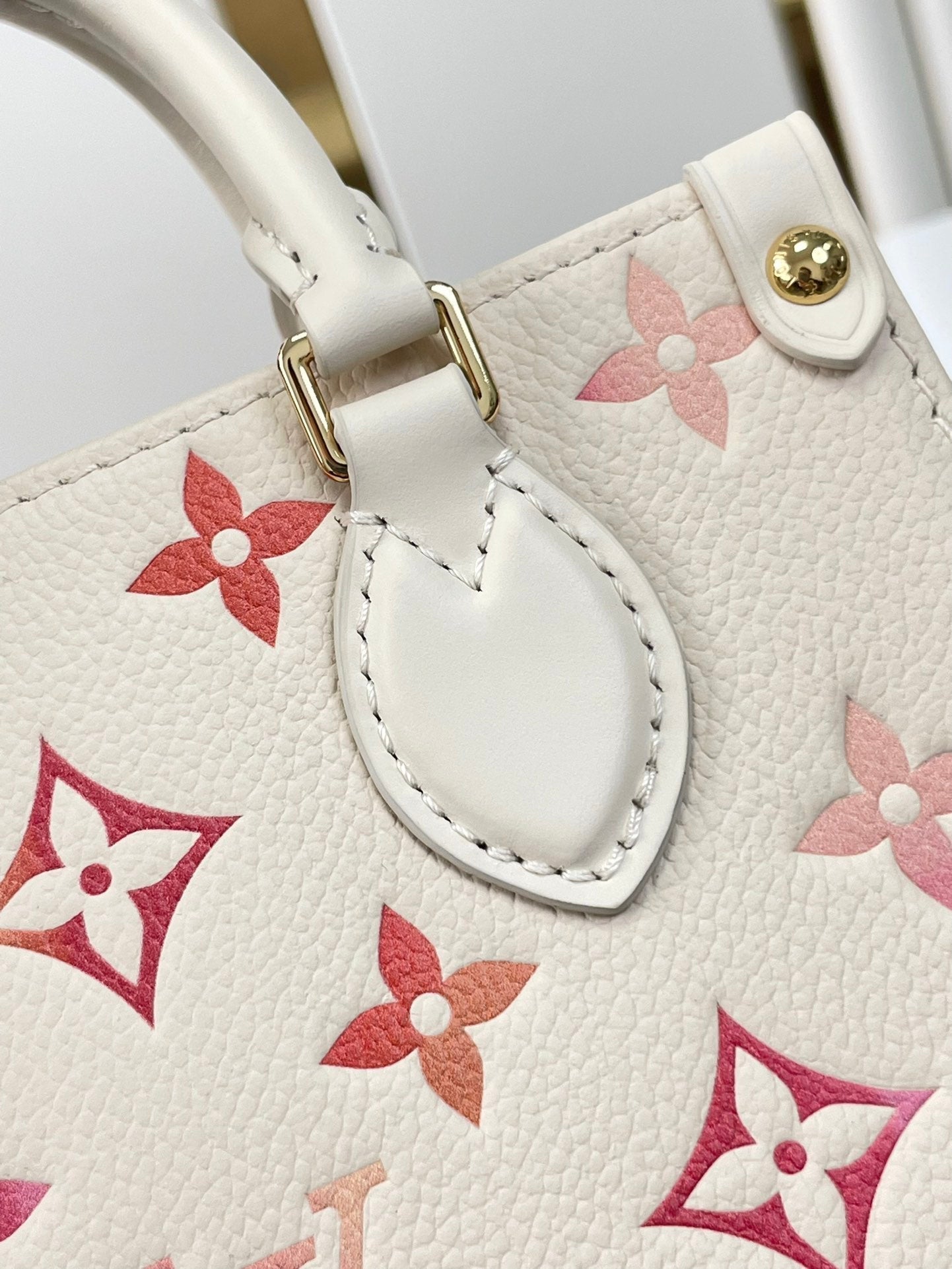 LOUIS VUITTON ONTHEGO BB 18 IN SUNRISE AQUARELLE MONOGRAM EMPREINTE LEATHER
