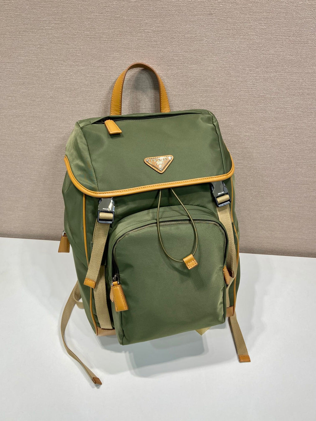 PRADA BACKPACK 45 IN SEAWEED GREEN RE-NYLON AND BROWN CALFSKIN TRIM