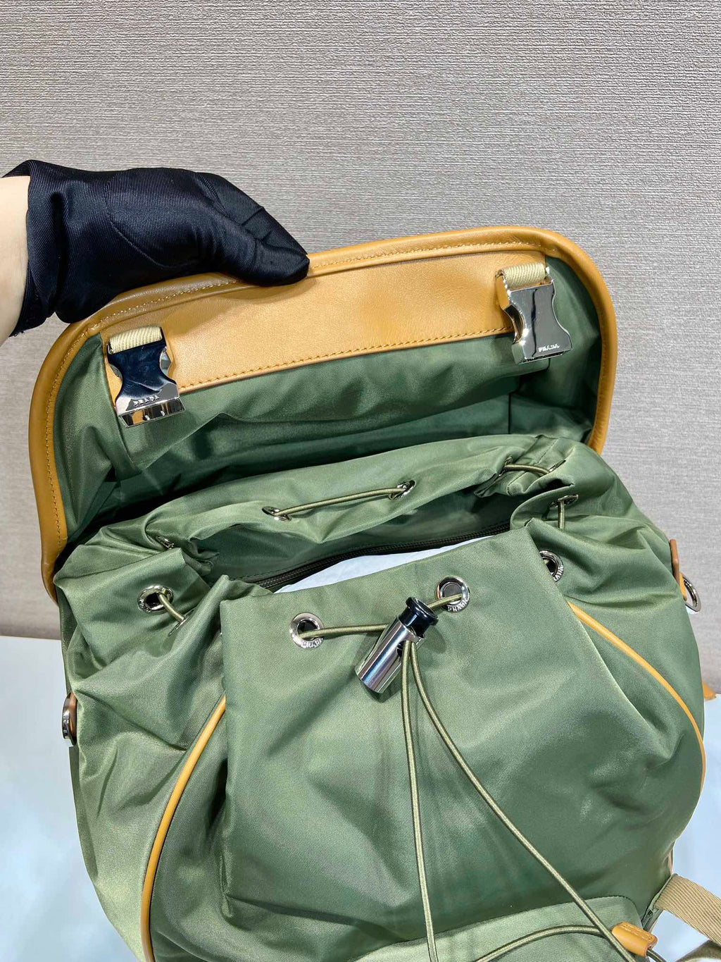 PRADA BACKPACK 45 IN SEAWEED GREEN RE-NYLON AND BROWN CALFSKIN TRIM