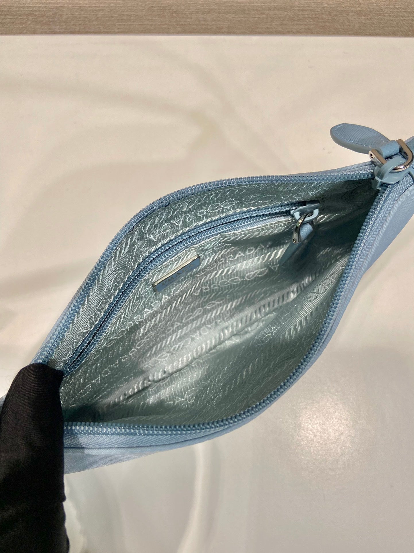 PRADA SHOULDER BAG 24 WITH TRIANGLE LOGO IN SKY BLUE RE-NYLON FABRIC