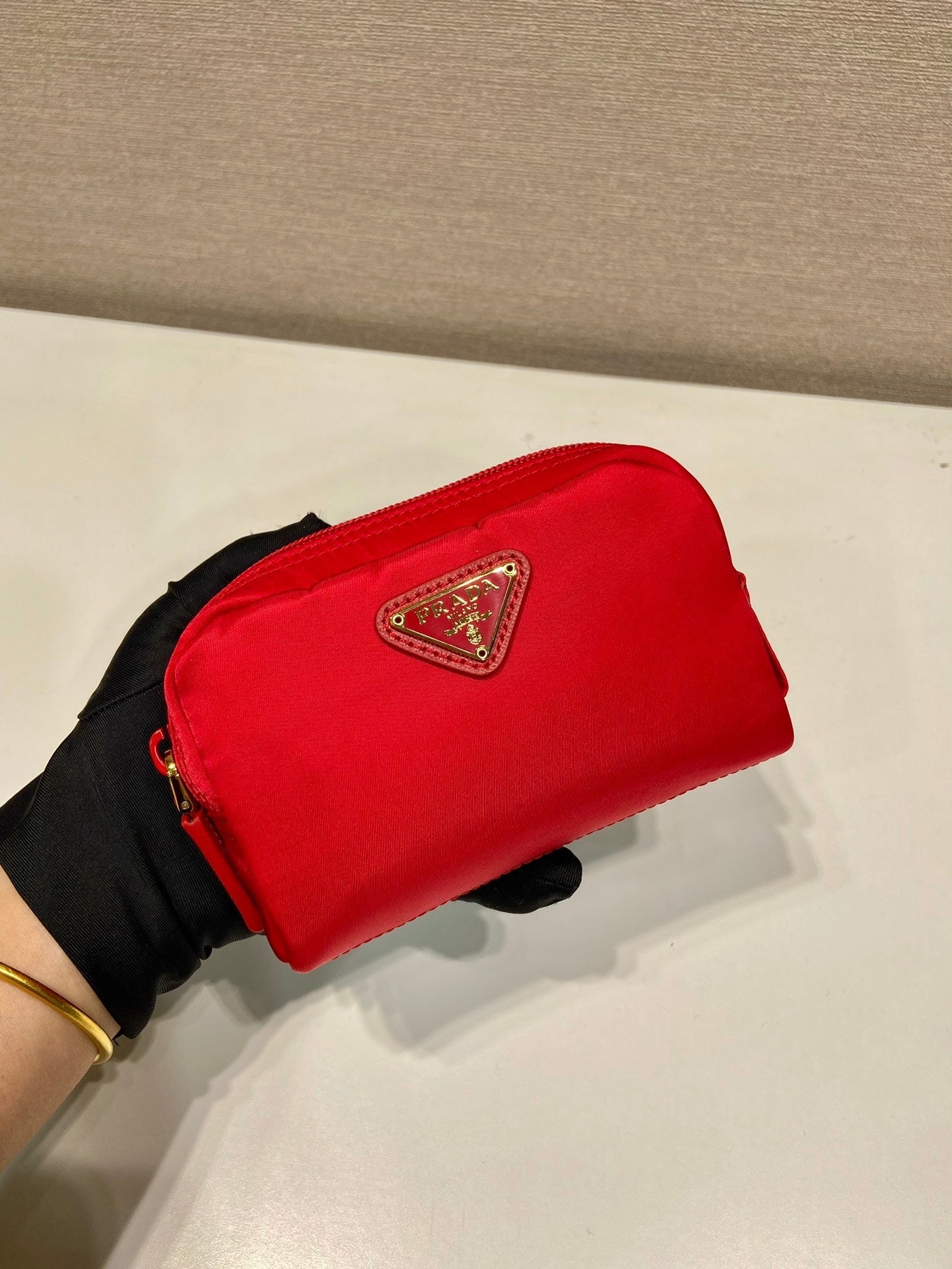 PRADA CLUTCH 12 IN PASSION RED RE-NYLON