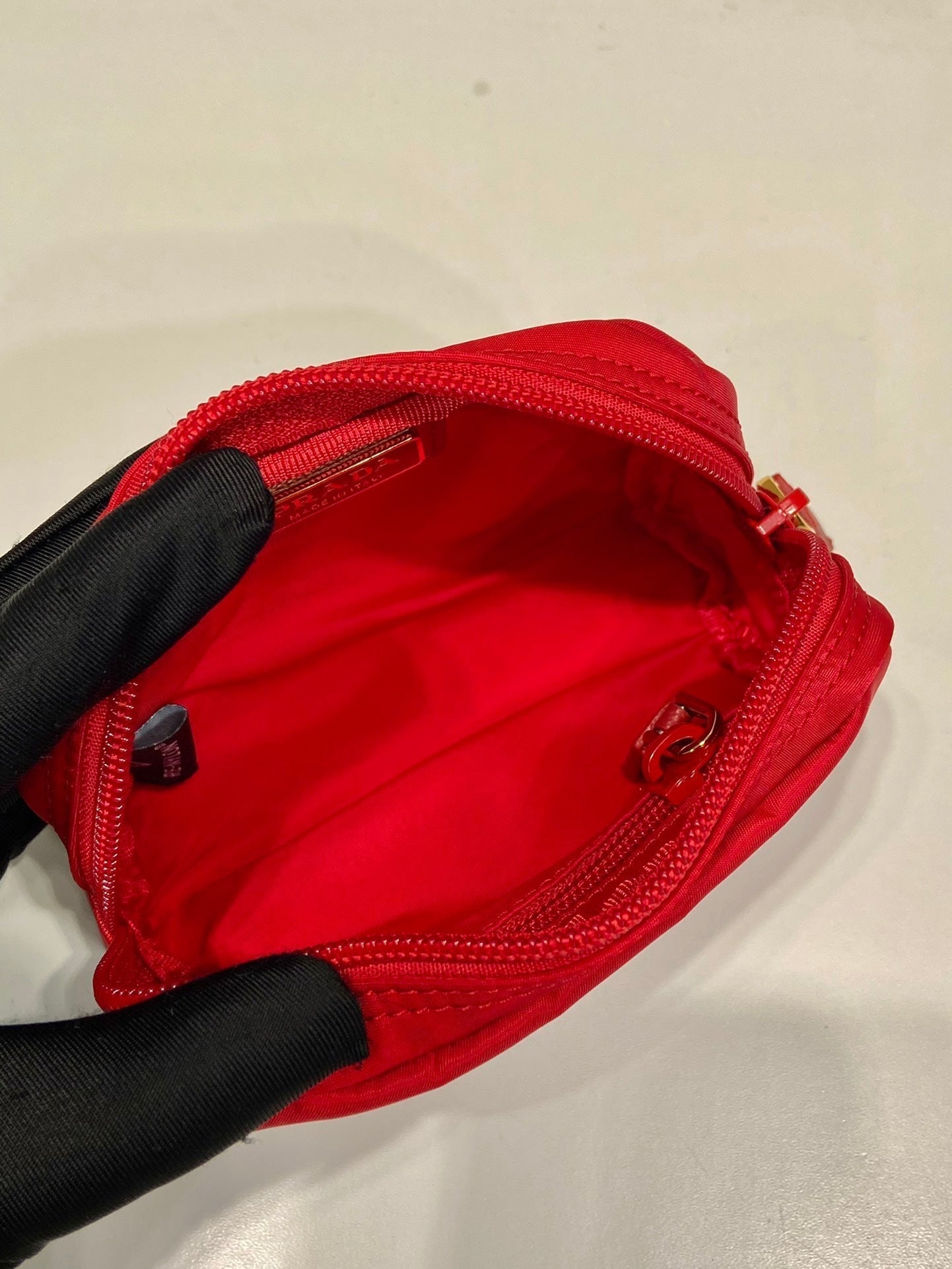 PRADA CLUTCH 12 IN PASSION RED RE-NYLON