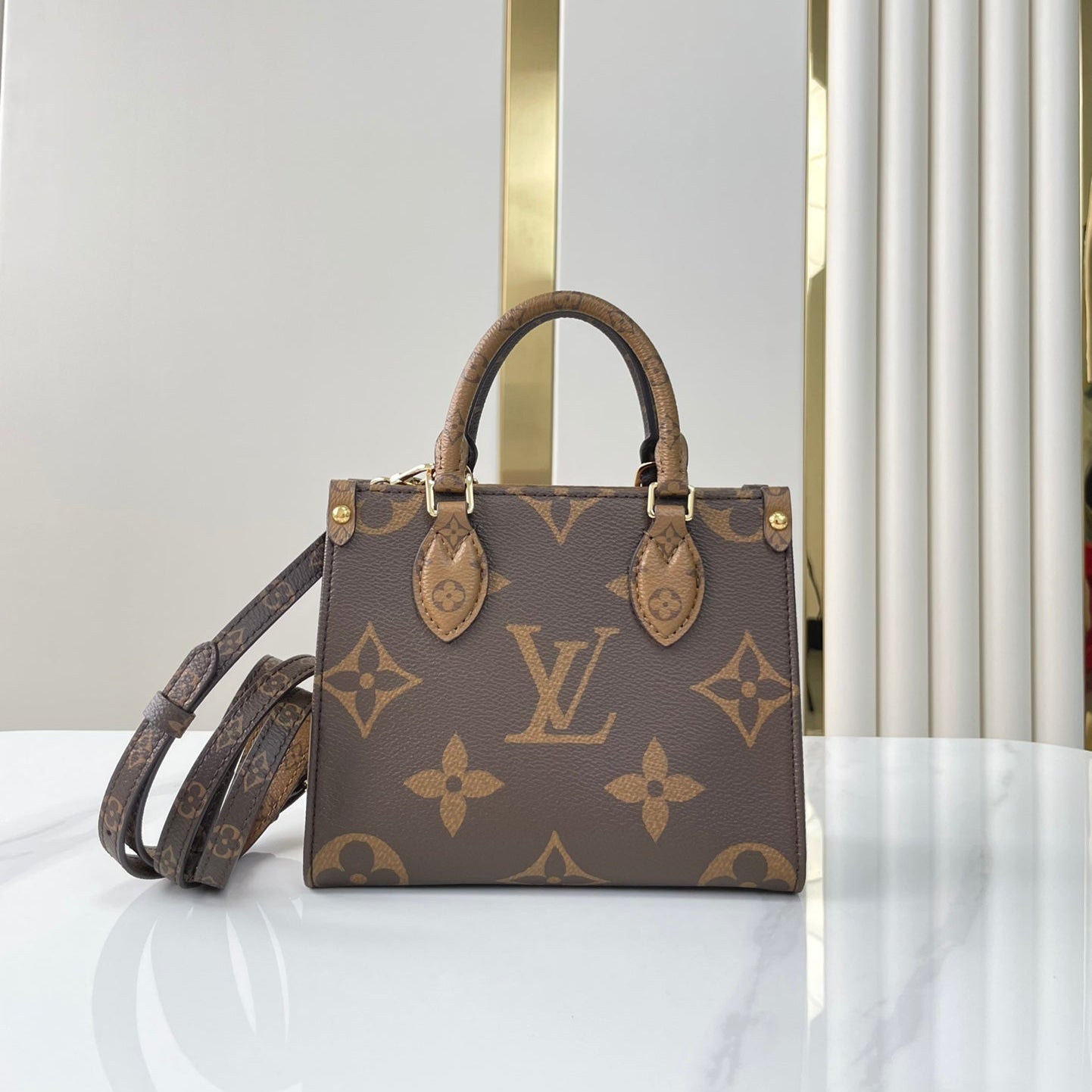LOUIS VUITTON ONTHEGO BB 18 IN BROWN MONOGRAM AND MONOGRAM REVERSE CANVAS