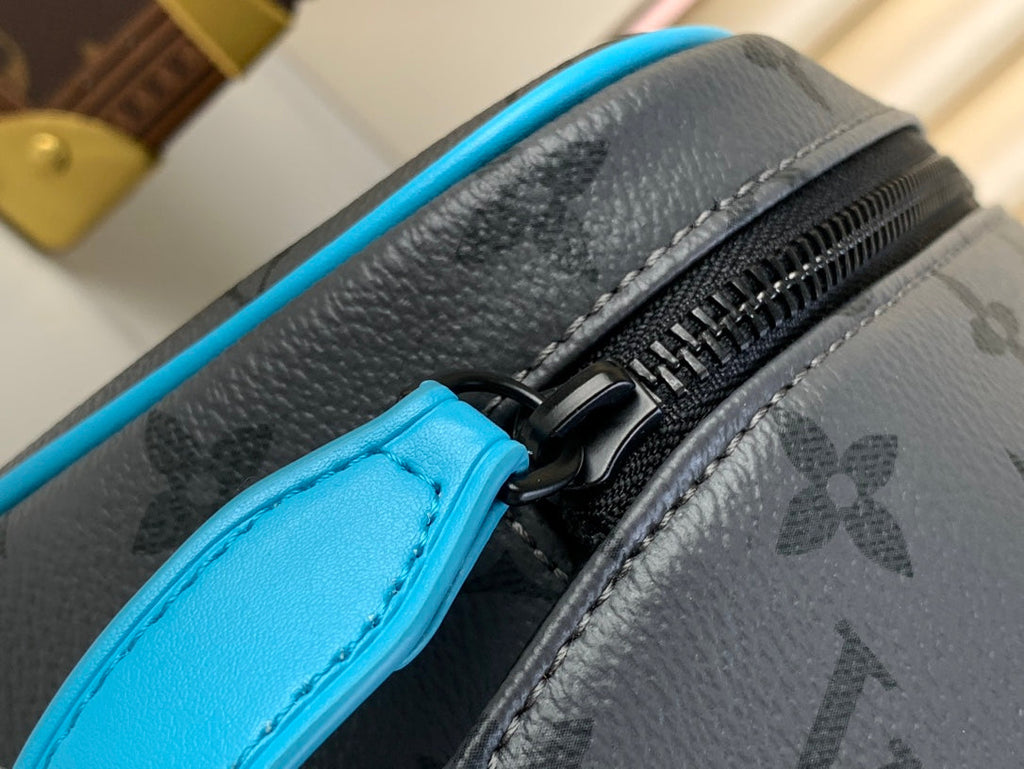 LOUIS VUITTON DOPP KIT 28 IN GUN METAL MONOGRAM ECLIPSE CANVAS AND TURQUOISE CALFSKIN TRIM