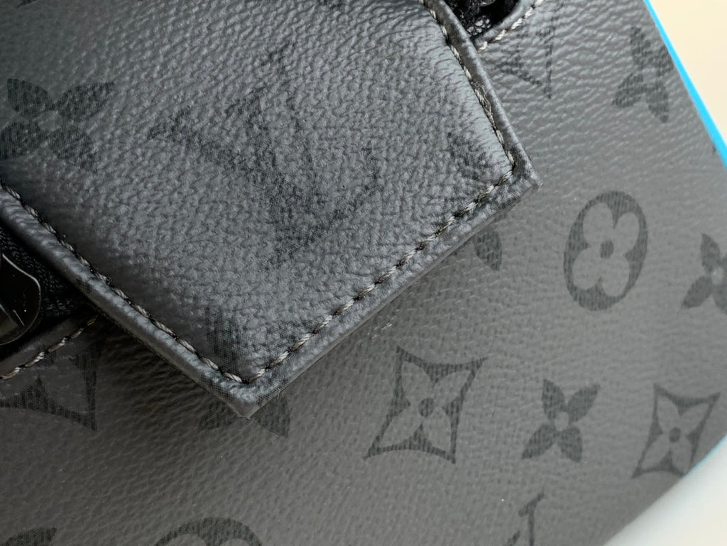 LOUIS VUITTON DOPP KIT 28 IN GUN METAL MONOGRAM ECLIPSE CANVAS AND TURQUOISE CALFSKIN TRIM