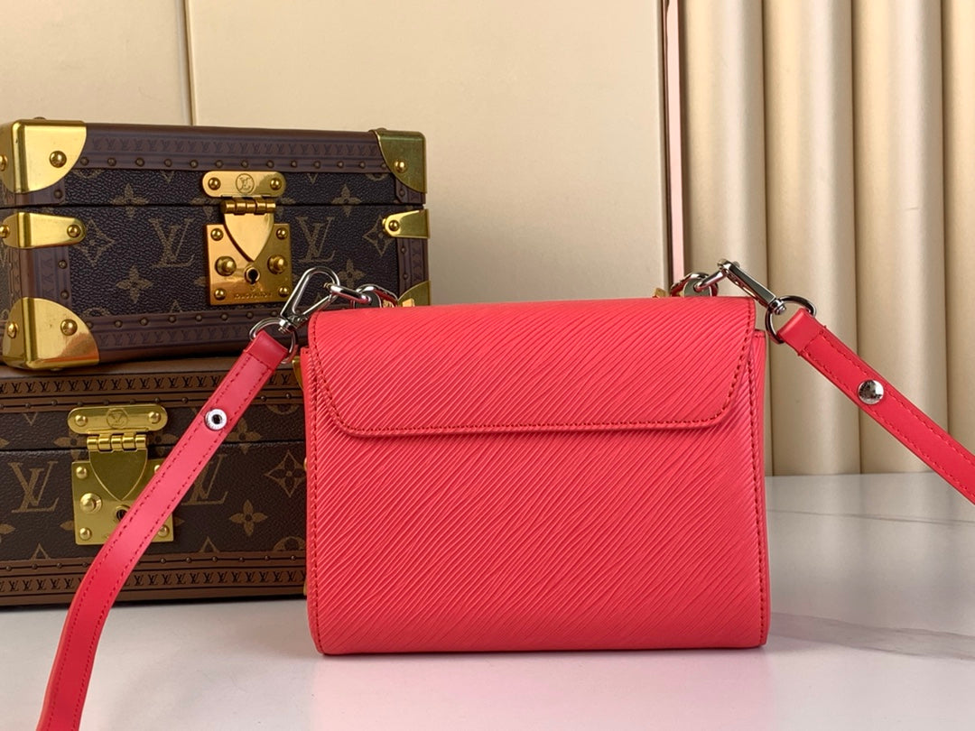 LOUIS VUITTON TWIST PM 19 IN RED EPI LEATHER GOLD AND SILVER HARDWARE
