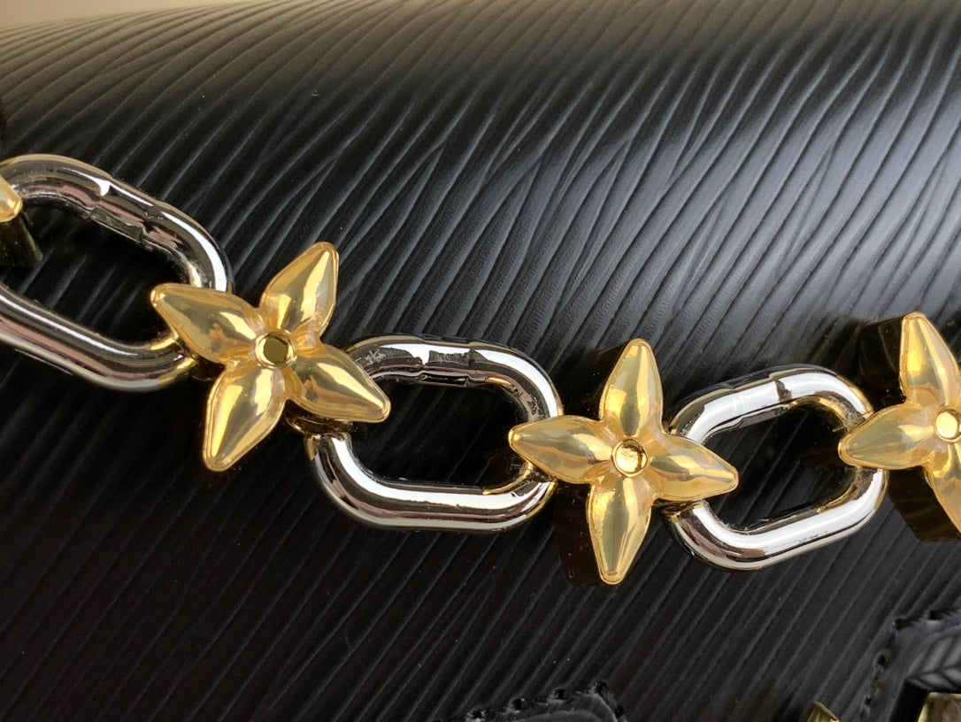 LOUIS VUITTON TWIST MM 23 IN BLACK EPI LEATHER GOLD AND SILVER HARDWARE
