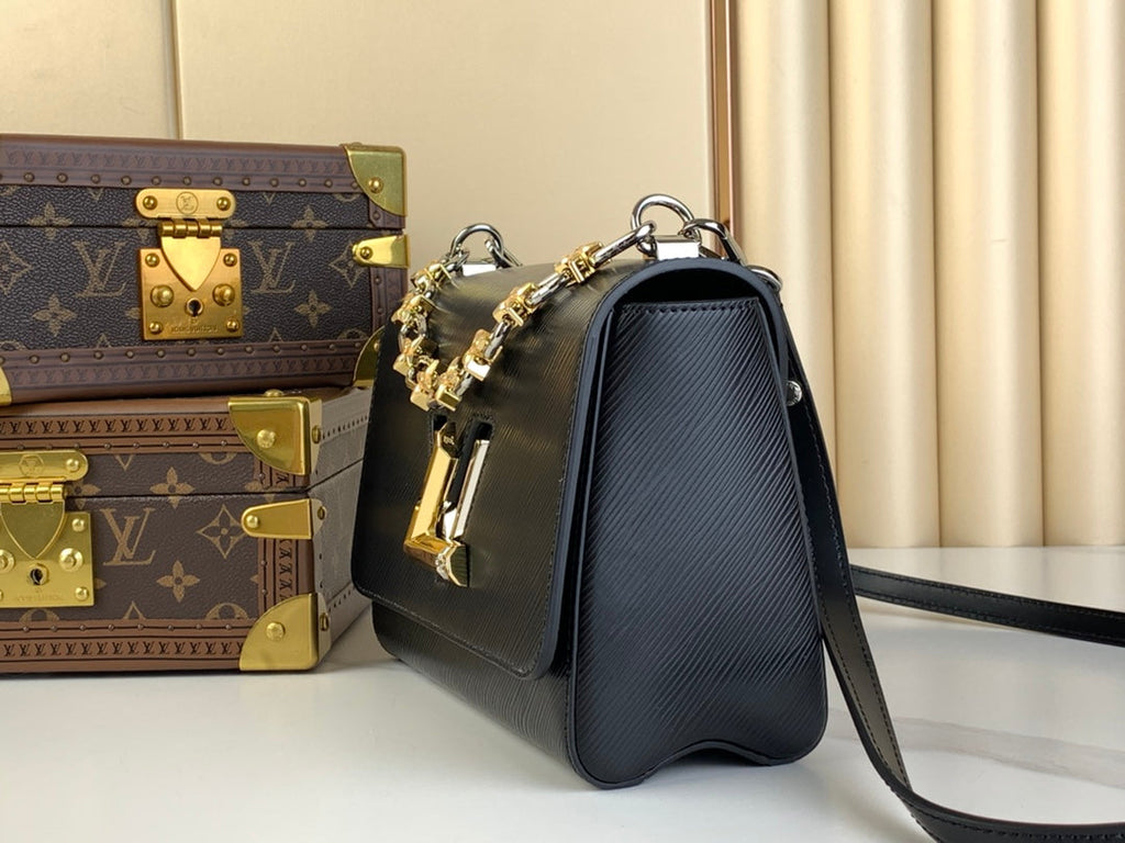 LOUIS VUITTON TWIST MM 23 IN BLACK EPI LEATHER GOLD AND SILVER HARDWARE