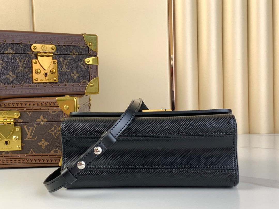 LOUIS VUITTON TWIST MM 23 IN BLACK EPI LEATHER GOLD AND SILVER HARDWARE