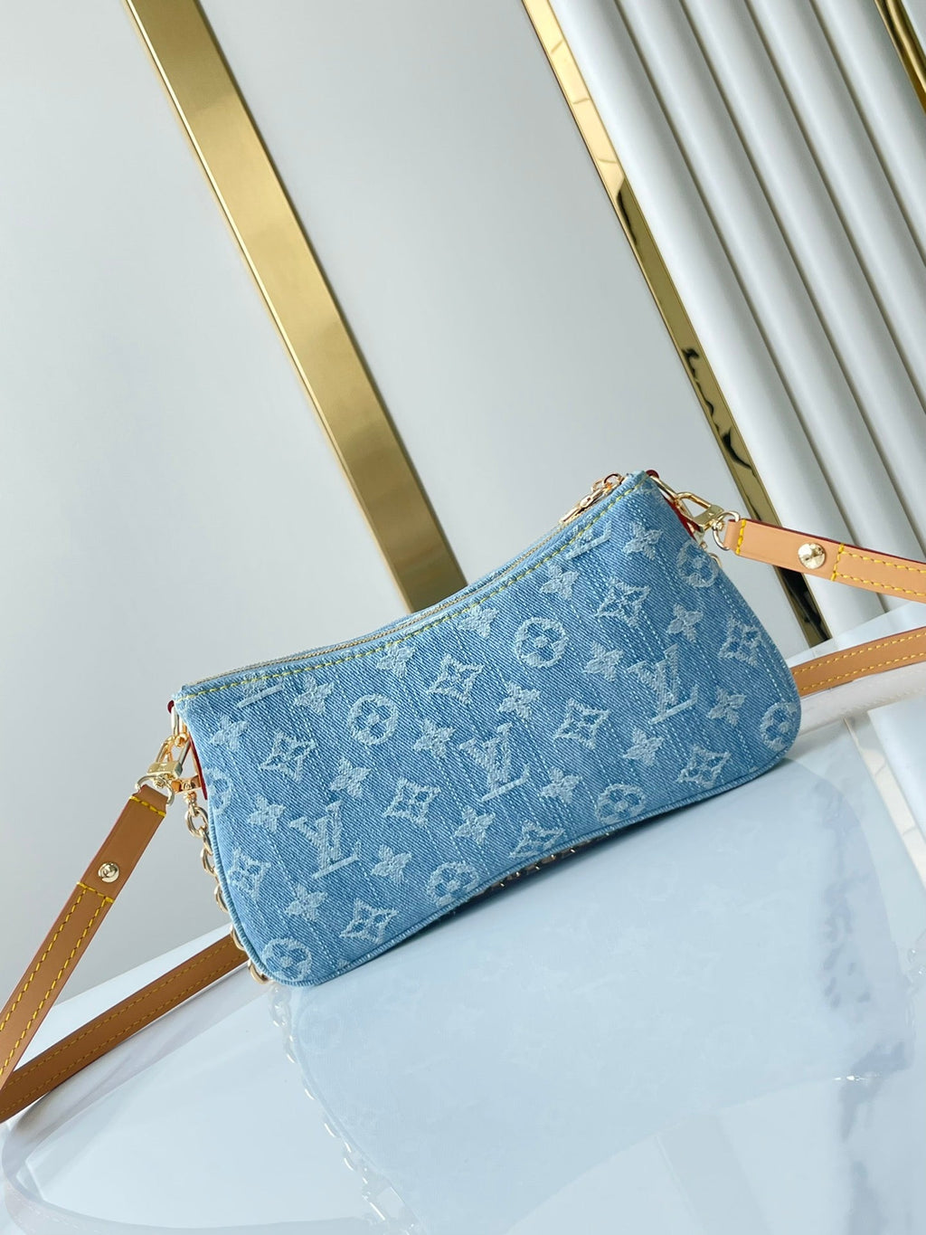 LOUIS VUITTON LIV POCHETTE 24 IN BLUE MONOGRAM DENIM GOLD HARDWARE