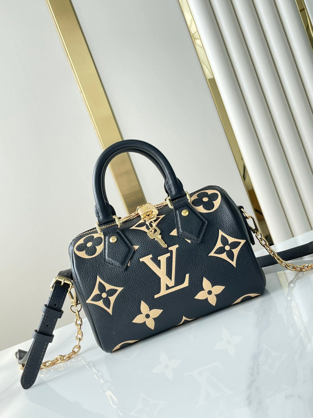 LOUIS VUITTON SPEEDY BANDOULIÈRE 20 IN BLACK CREAM MONOGRAM EMPREINTE LEATHER GOLD HARDWARE