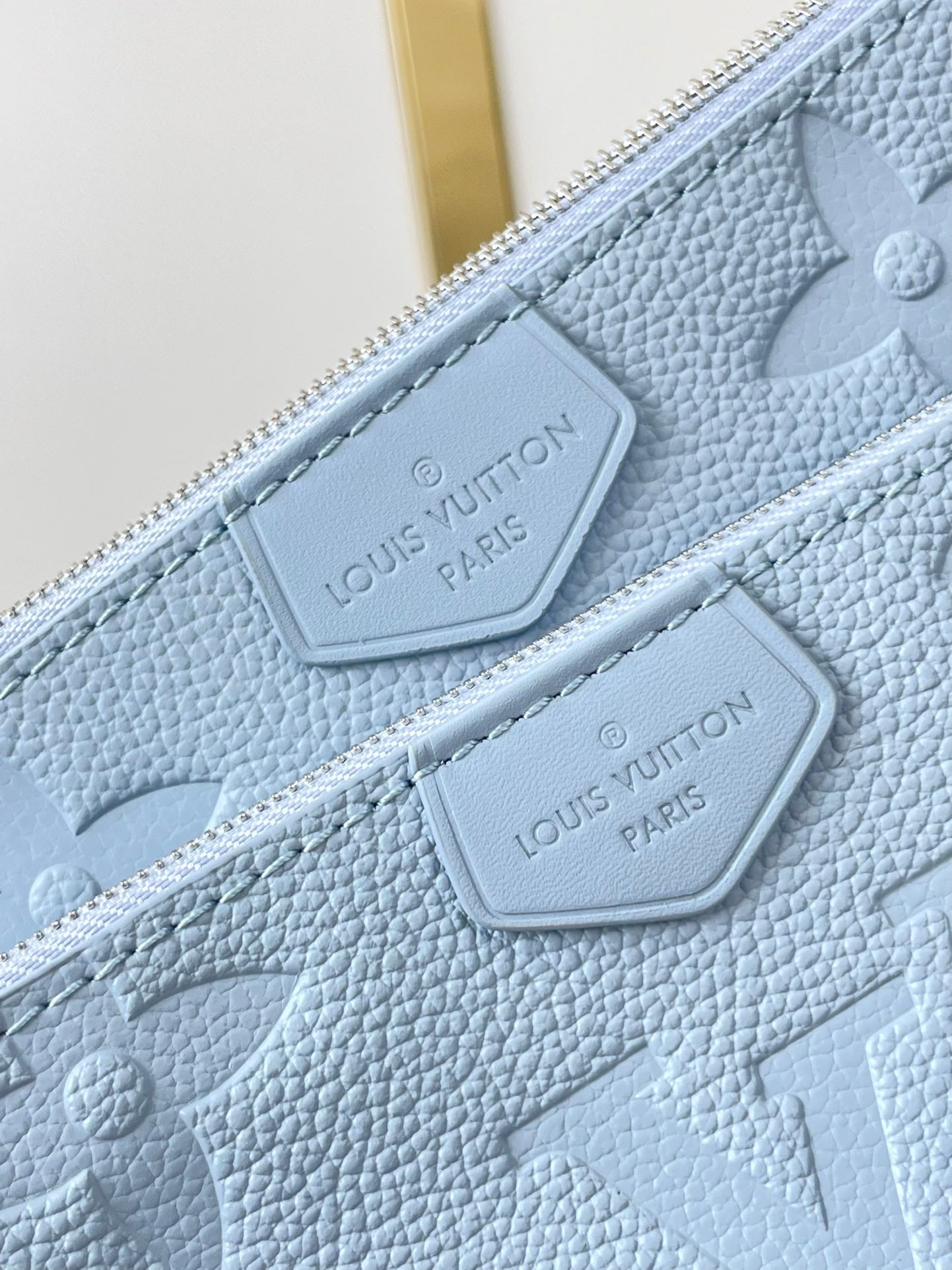LOUIS VUITTON MULTI POCHETTE ACCESSOIRES 24 IN BEAU BLUE MONOGRAM EMPREINTE LEATHER