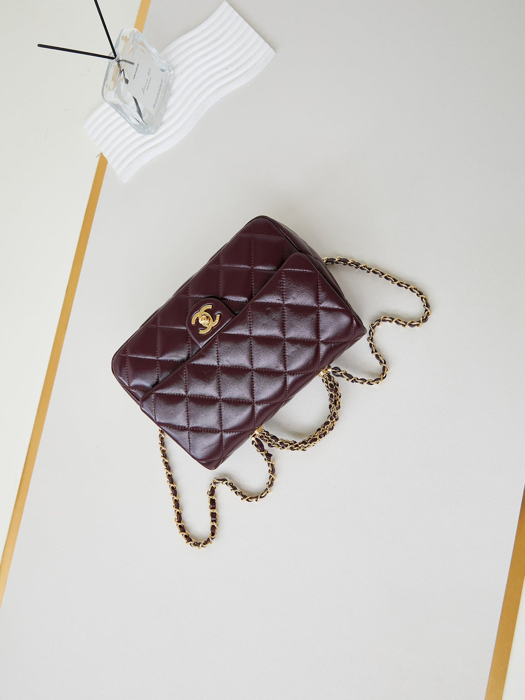 CHANEL FLAP BAG WITH TOP HANDLE 25 IN WINE RED OIL-WAX LAMBSKIN GOLD HARDWARE