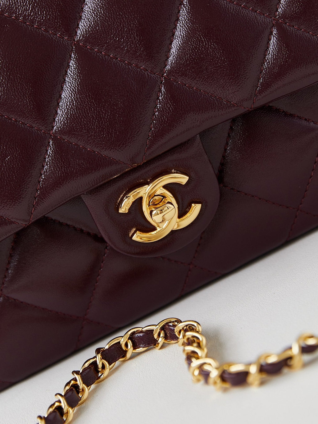 CHANEL FLAP BAG WITH TOP HANDLE 25 IN WINE RED OIL-WAX LAMBSKIN GOLD HARDWARE