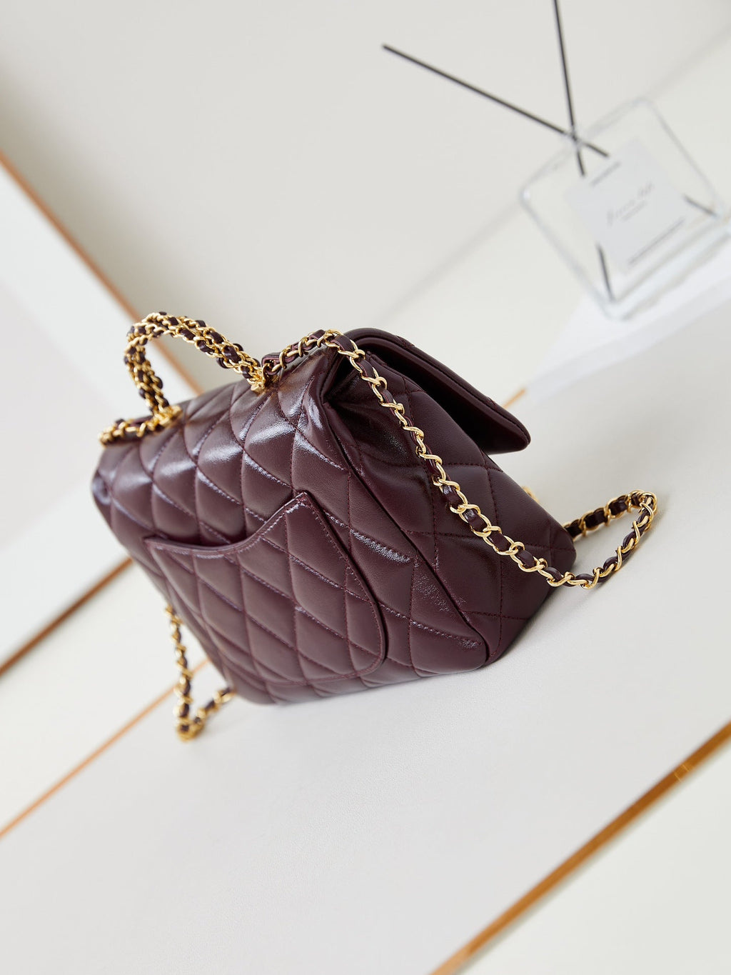 CHANEL FLAP BAG WITH TOP HANDLE 25 IN WINE RED OIL-WAX LAMBSKIN GOLD HARDWARE