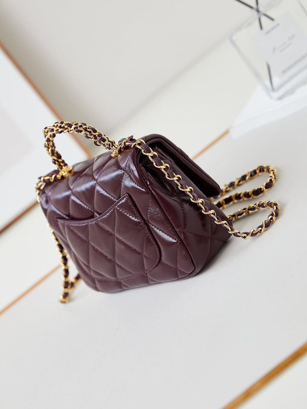CHANEL FLAP BAG WITH TOP HANDLE 18 IN WINE RED OIL-WAX LAMBSKIN GOLD HARDWARE