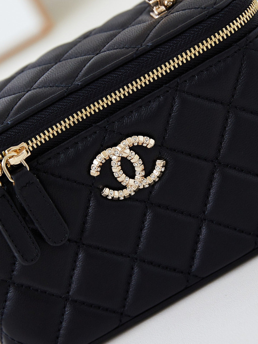 CHANEL 25S MINI VANITY BAG 16 CM IN BLACK LAMBSKIN WITH CRYSTAL-EMBELLISHED  LOGO
