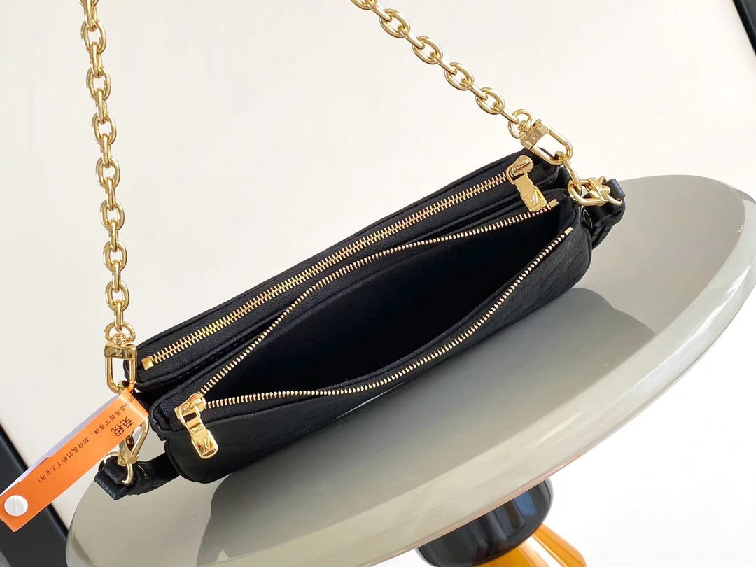 LOUIS VUITTON LIV POCHETTE 24 IN BLACK MONOGRAM EMPREINTE LEATHER GOLD HARDWARE
