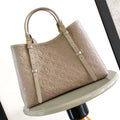 LOUIS VUITTON BABYLONE TOTE MM 39 IN TOURTERELLE MONOGRAM EMPREINTE LEATHER