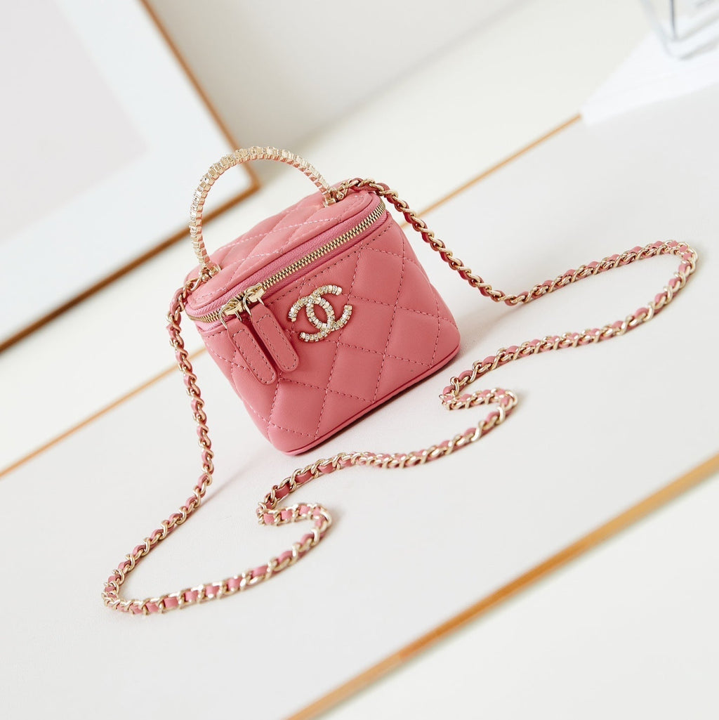 CHANEL 25S MINI VANITY BAG 11 CM IN PEACH PINK LAMBSKIN WITH CRYSTAL-EMBELLISHED  LOGO