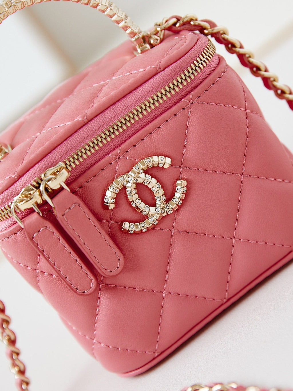 CHANEL 25S MINI VANITY BAG 11 CM IN PEACH PINK LAMBSKIN WITH CRYSTAL-EMBELLISHED  LOGO