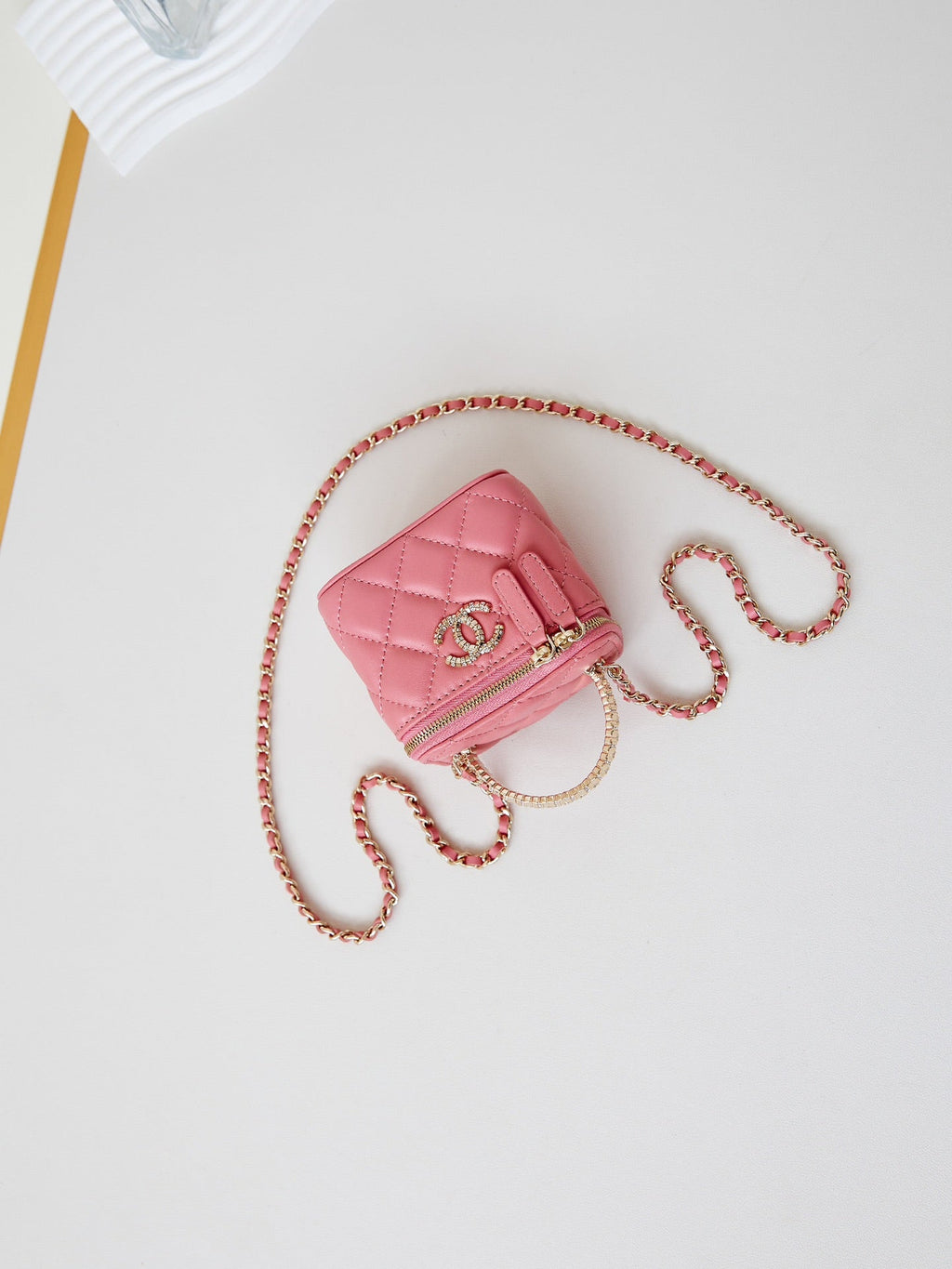 CHANEL 25S MINI VANITY BAG 11 CM IN PEACH PINK LAMBSKIN WITH CRYSTAL-EMBELLISHED  LOGO