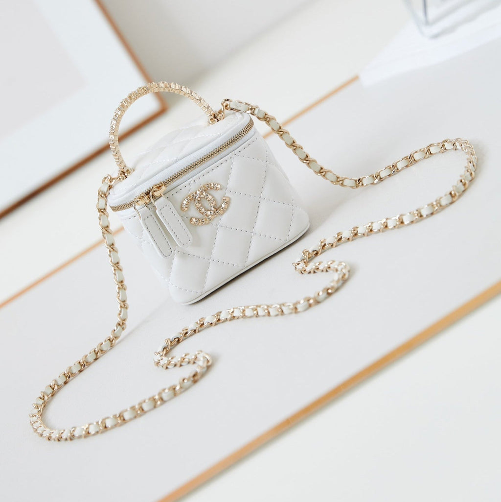 CHANEL 25S MINI VANITY BAG 11 CM IN WHITE LAMBSKIN WITH CRYSTAL-EMBELLISHED  LOGO