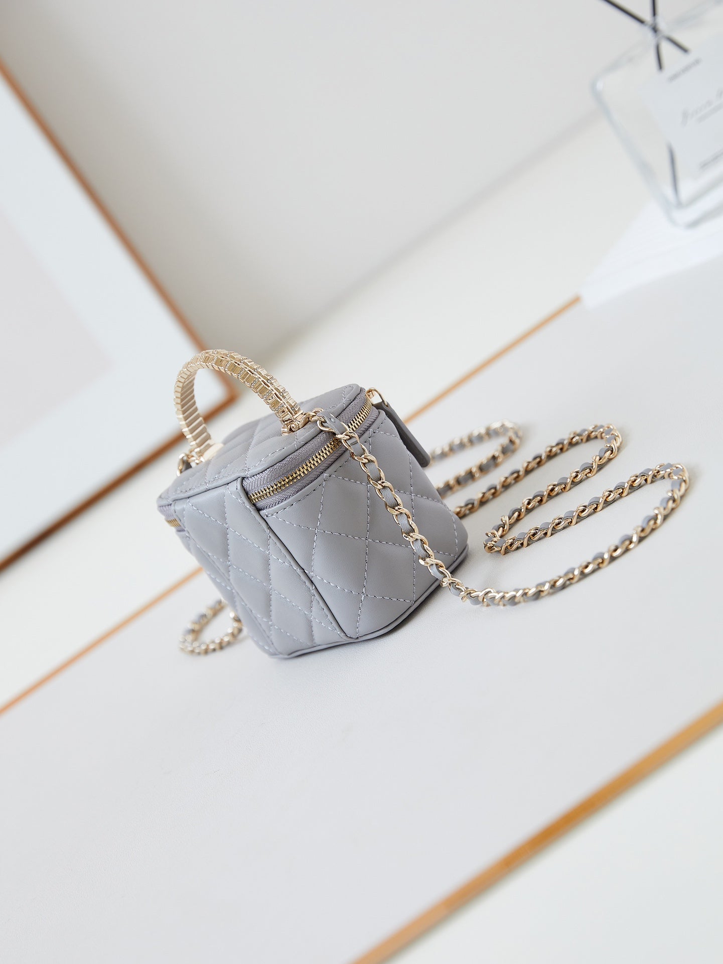 CHANEL 25S MINI VANITY BAG 11 CM IN GREY LAMBSKIN WITH CRYSTAL-EMBELLISHED  LOGO