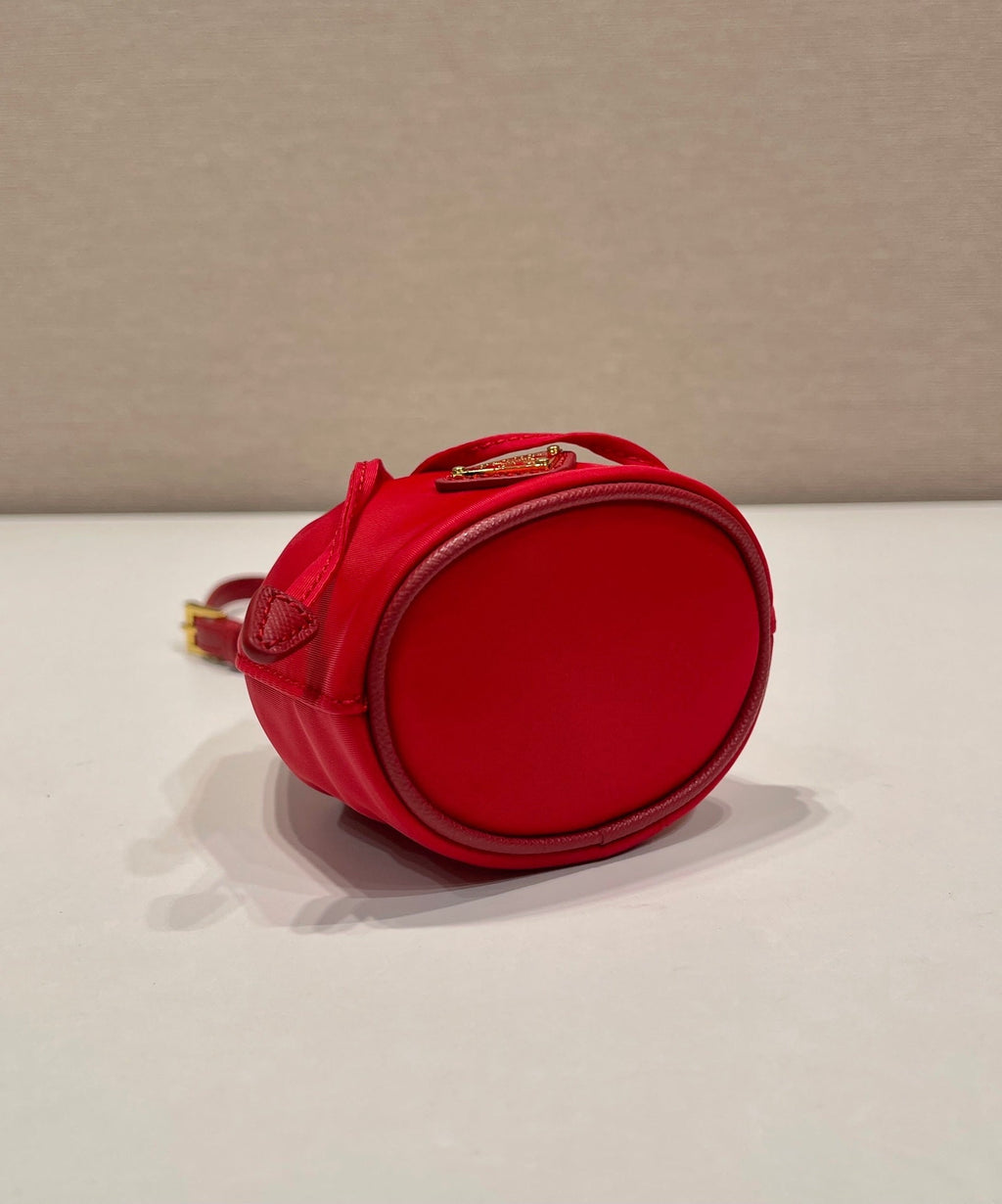 PRADA MINI BUCKET BAG 10 IN RED RE-NYLON AND SAFFIANO LEATHER STRAP