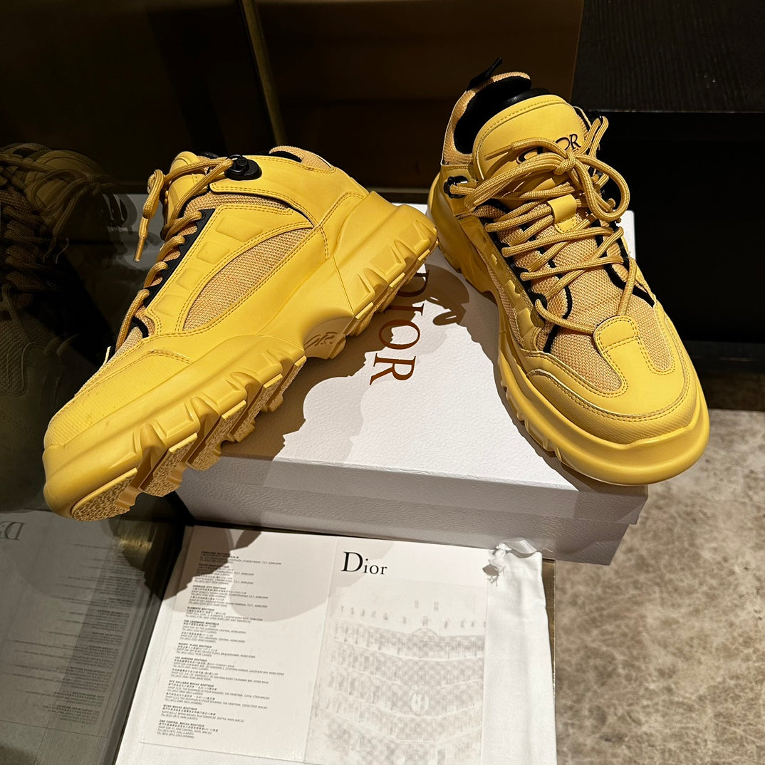 DIOR C'EST SNEAKER IN CLASSIC YELLOW CALFSKIN AND BREATHABLE MESH