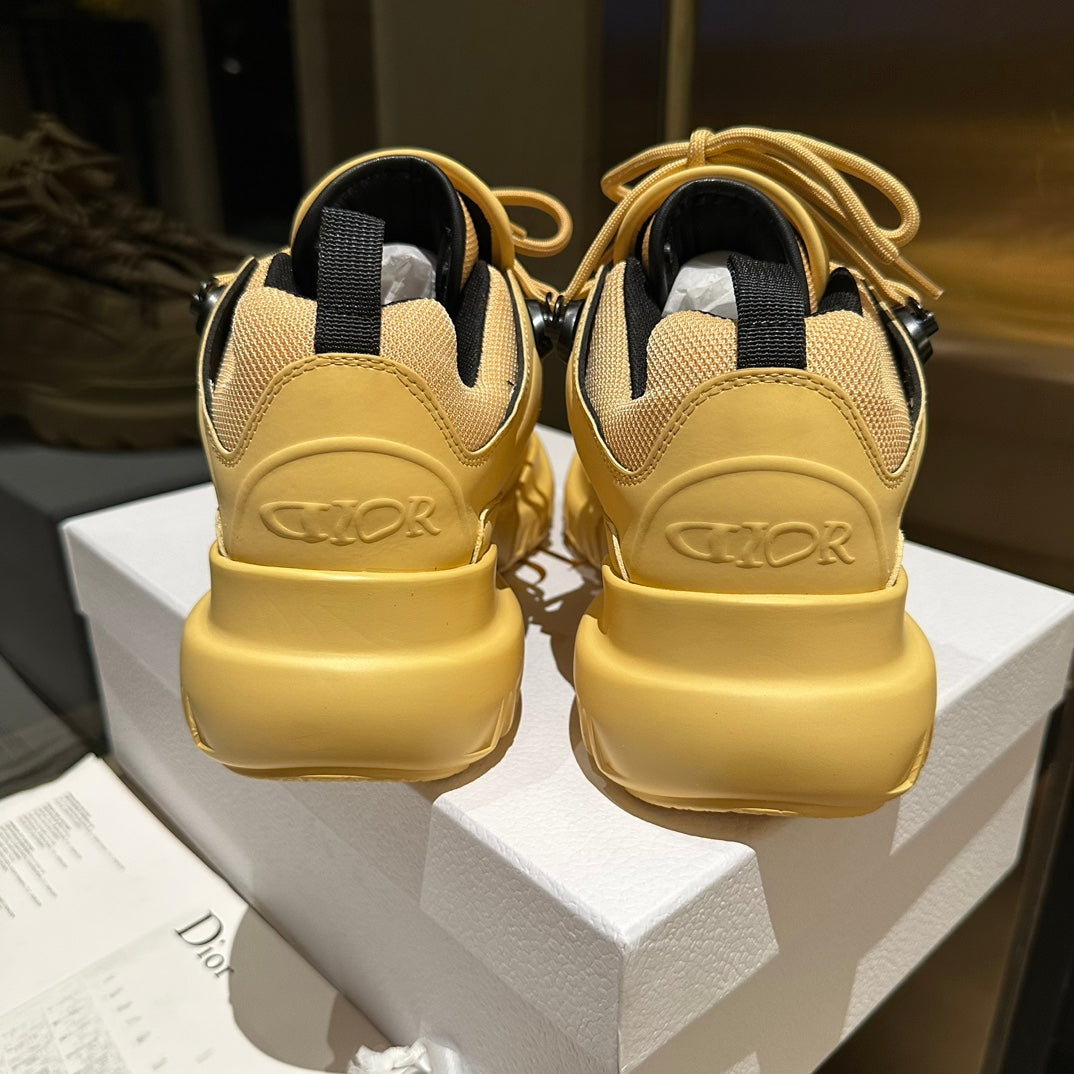 DIOR C'EST SNEAKER IN CLASSIC YELLOW CALFSKIN AND BREATHABLE MESH