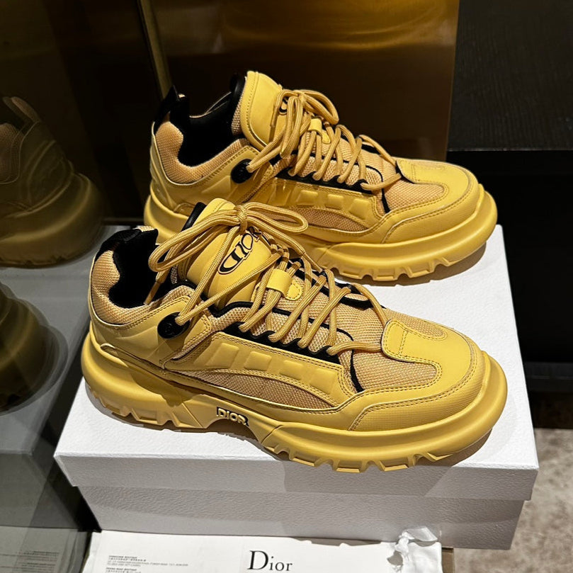 DIOR C'EST SNEAKER IN CLASSIC YELLOW CALFSKIN AND BREATHABLE MESH
