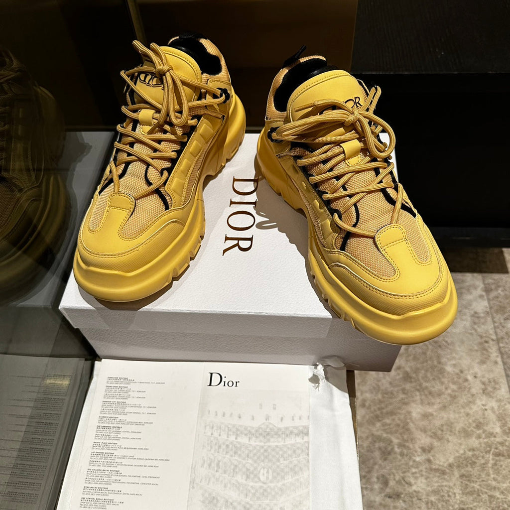 DIOR C'EST SNEAKER IN CLASSIC YELLOW CALFSKIN AND BREATHABLE MESH