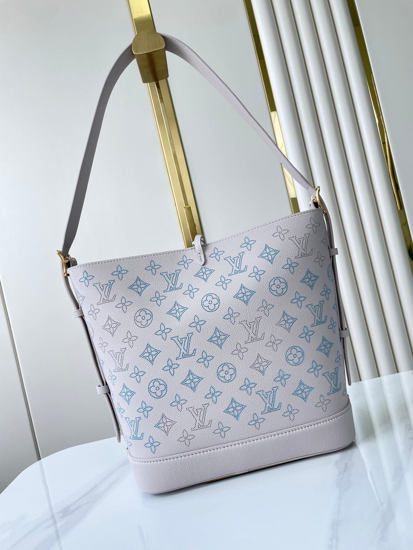 LOUIS VUITTON FLORE 28 IN WHITE PERFORATED CALFSKIN