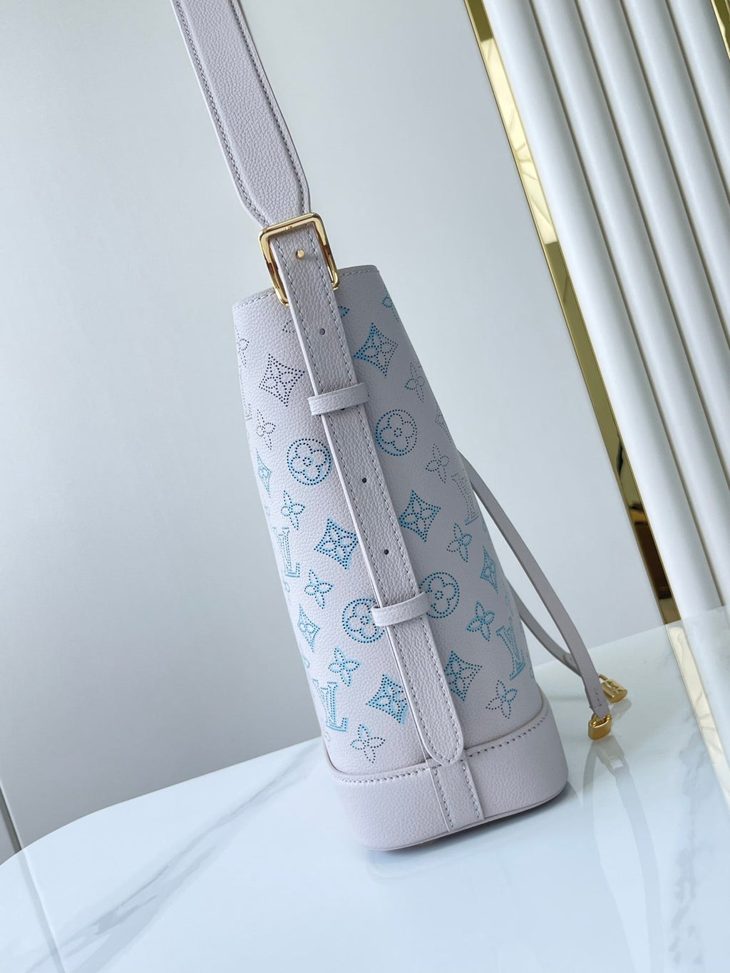 LOUIS VUITTON FLORE 28 IN WHITE PERFORATED CALFSKIN