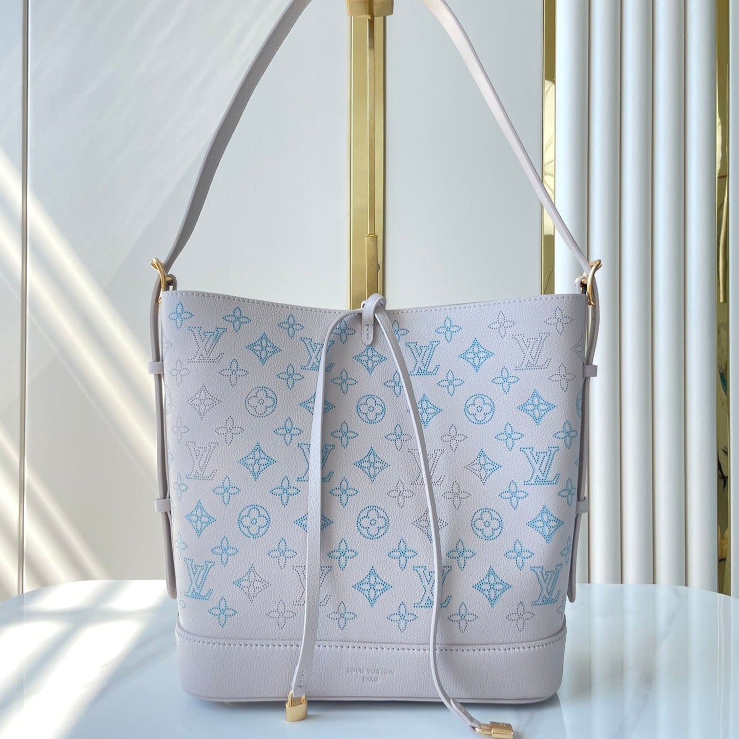 LOUIS VUITTON FLORE 28 IN WHITE PERFORATED CALFSKIN