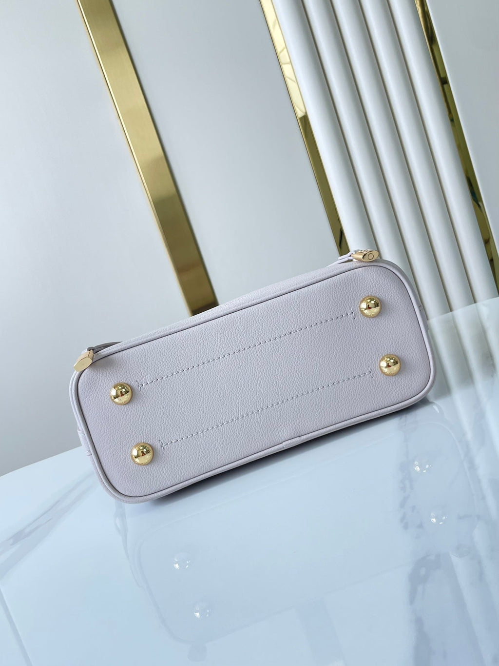 LOUIS VUITTON FLORE 28 IN WHITE PERFORATED CALFSKIN