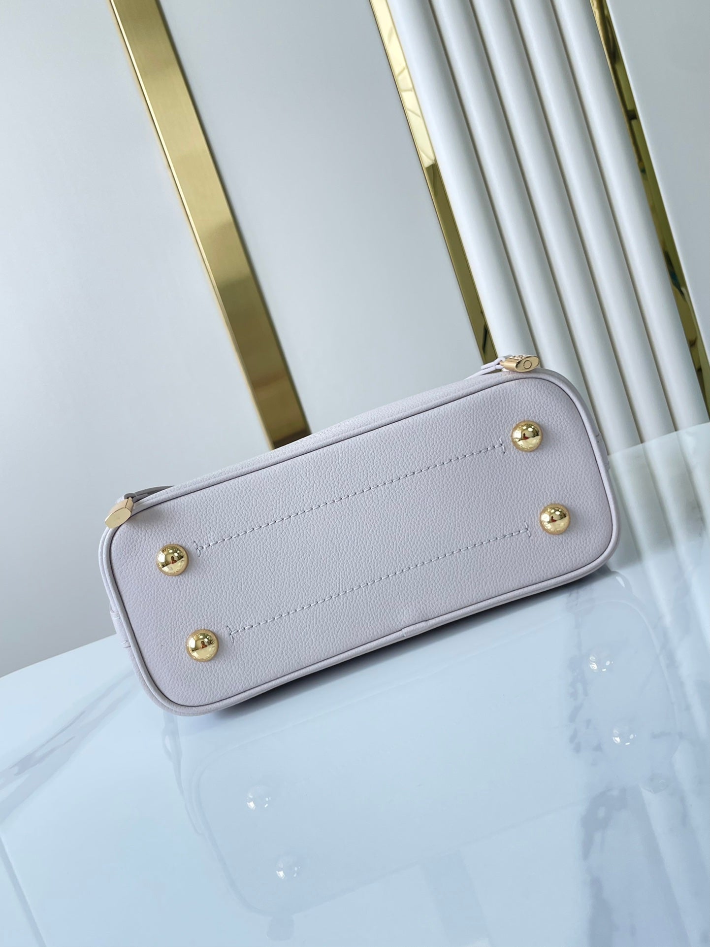 LOUIS VUITTON FLORE 28 IN WHITE PERFORATED CALFSKIN