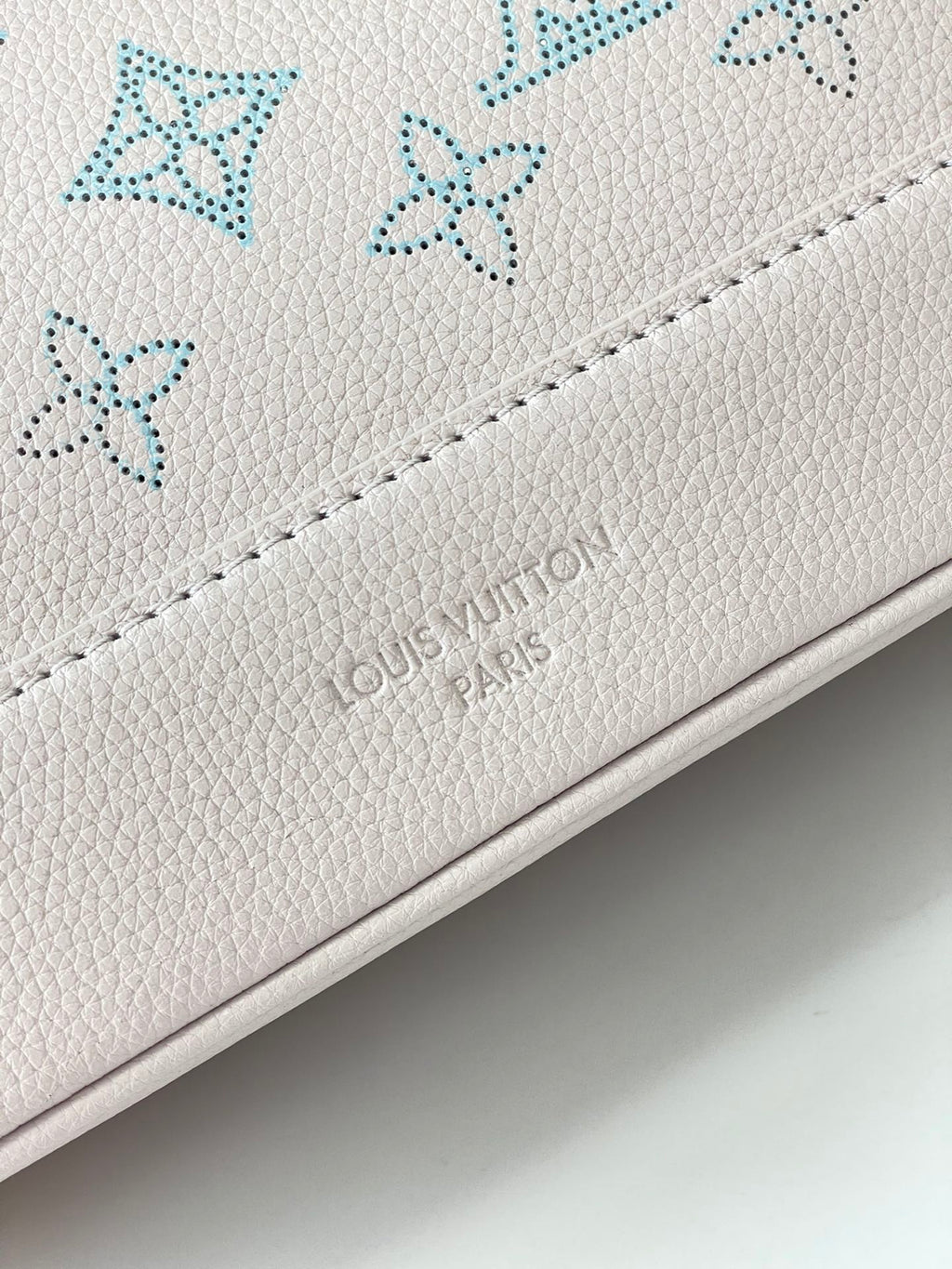 LOUIS VUITTON FLORE 28 IN WHITE PERFORATED CALFSKIN
